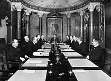 The Finnish Senate of 1917, Prime Minister P. E. Svinhufvud in the head of table. The Senate declared Finland independent on 4 December 1917, and it was confirmed by parliament 6 December 1917 which became the Independence Day of Finland. Senate1917.jpg