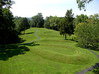 View of the Great Serpent Mound in Adams County, Ohio. Carbon tests of the effigy revealed that the creators of this 1,330-foot monument were members of the Native-American Fort Ancient Culture (A.D. 1000-1550).