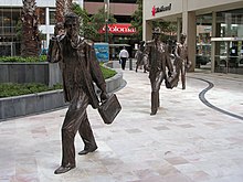 St Martin's Tower, Perth Western Australia. Sculptures by Joan Walsh-Smith, Charles Smith St Martins Tower statues.jpg