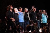 The Steve Miller Band (pictured in 2009) had their first number one on the NME chart (with "Abracadabra") a decade before they had their first "official" number one. Steve Miller Band Ravinia.jpg