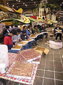 Volunteers TOR volunteers prepping flowers.jpg