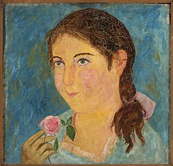 Girl holding a rose in her hand