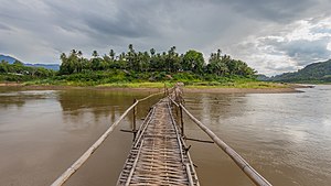 Temporary wooden footbridge leading to the city of Luang Prabang.jpg