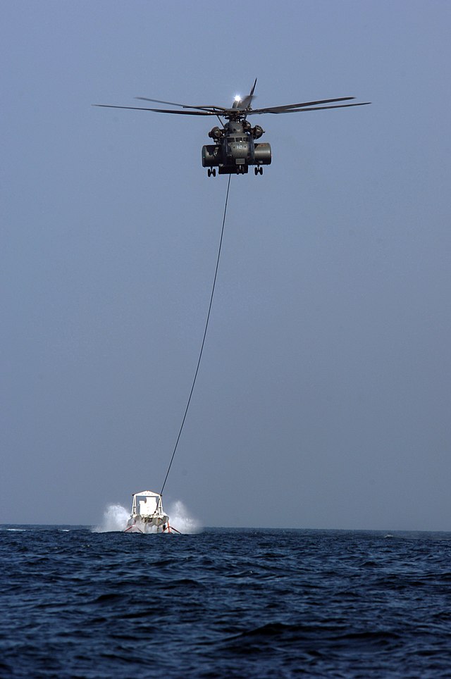 File:US Navy 061106-N-5555T-001 HM-53E Sea Dragon helicopters assigned to  Helicopter Mine Countermeasure Squadron One Five (HM-15) demonstrate the  mine sweeping capabilities of the Navy's MK-105 Magnetic Influence  System.jpg - Wikimedia