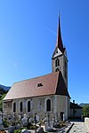 Parish church of St. Georg with cemetery chapel and cemetery in Vahrn