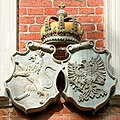 Wappen an Hauswand in Plön (Schleswig-Holstein) II
