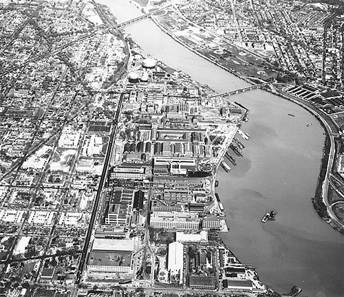 The Washington Navy Yard and its vicinity circa 1960. The Anacostia River runs diagonally from upper left to lower right center, crossed by the Eleventh Street Bridge (in center) and the Sousa Bridge (Pennsylvania Avenue) near the top