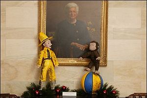 The White House 2003 Christmas decoration using Curious George as the theme with the Barbara Bush portrait.