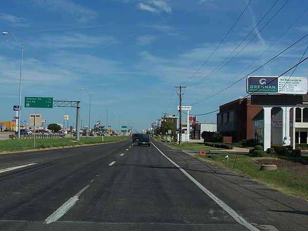 A frontage road for Texas State Highway 183 (Airport Freeway) in Irving, Texas