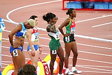 Hodge (right) in the first heat of the second round of the women's 100m sprint 2008 Summer Olympics - Womens 100m Round 2 - Heat 1.jpg