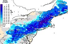 Une image montrant un gros nuage bleuté au-dessus du nord-est des États-Unis, les nuances de bleu plus foncé représentant les plus fortes chutes de neige