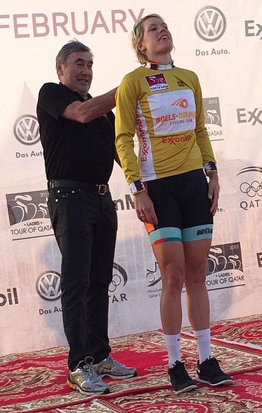 Eddy Merckx presenting Ellen van Dijk with the gold leader's jersey after the first stage of the 2015 Ladies Tour of Qatar.