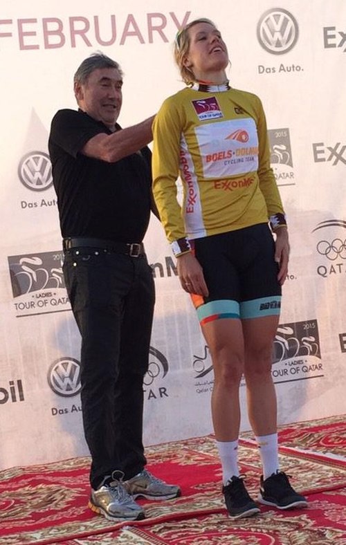 Eddy Merckx presenting Ellen van Dijk with the gold leader's jersey after the first stage of the 2015 Ladies Tour of Qatar.