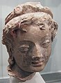 Jeune femme. Hadda, Monastère de Tapa-i-Kafariha IIIe - IVe siècle. Stuc avec traces de polychromie. Musée Guimet.