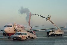 AirBerlin Boeing737-86J D-ABKHdeicingTXL-2 cropped.jpg