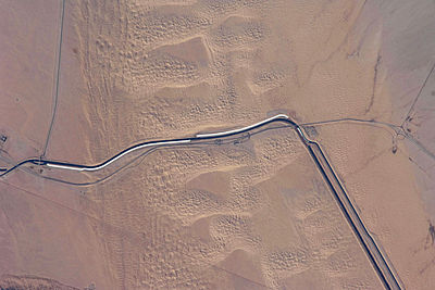 View of the Coachella Canal (upper-left of image) just west of Yuma, Arizona. Note: North is to upper-right.