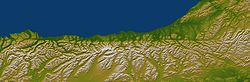 Elevation map of the west coast of New Zealand's South Island showing the sharp line formed by the Alpine Fault. North is to the right. Alpine Fault SRTM.jpg