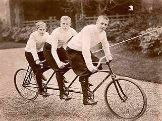 Brazilian princes (from left) Antônio, Luís, and Pedro riding a triple tandem bicycle during their exile, 1891