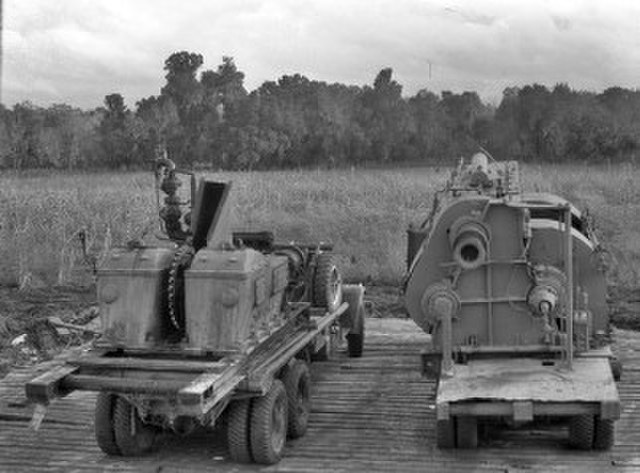 Back view of agricultural trucks, 1939