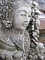 Balinese stone guardian at [Ubud Palace]