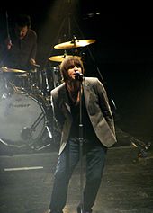 Gallagher performing with Beady Eye in March 2011 Beady Eye.jpg