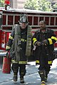 Chicago firefighters responding to a call on Michigan Ave.