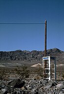 Telephon box on the desert road