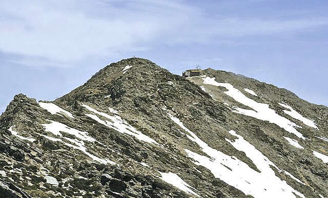 The Pico del Cervunal (foreground) and the Pico del Lobo (background) in El Cardoso de la Sierra. The Pico del Lobo stands as the tallest summit in th