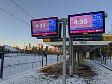 Platform of Erlton/Stampede station, with MNP Community & Sport Centre and downtown Calgary in the background Erlton-StampedeStationPlatformNovember2019.jpg