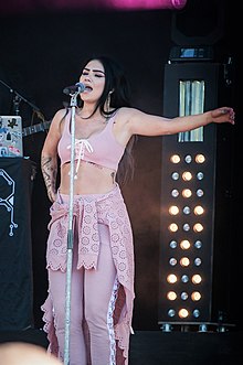 Evelina performing in the Ilosaarirock Festival in 2017. Evelina - Ilosaarirock 2017 - 02 (Cropped).jpg