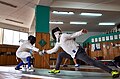 Fencing in Greece. Epee at Athenaikos Fencing Club. Agapitos Papadimitriou on the right.jpg