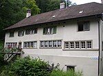 Ehemaliges Bauernhaus mit Scheunen