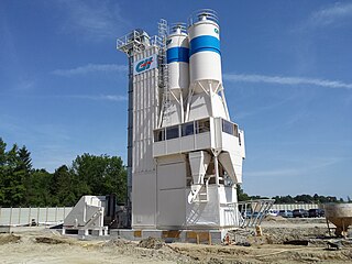 Concrete mixer Device that combines cement, aggregate, and water to form concrete