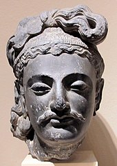 The head of a Gandhara Bodhisattava said to resemble a Kushan prince, as seen in the portrait of the prince from Khalchayan. Philadelphia Museum of Art. Gandhara, testa di bodhisattva, 190-210 dc ca..JPG