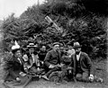 Group of people sitting on grass with dog, June 24, 1899 (WASTATE 2568).jpeg