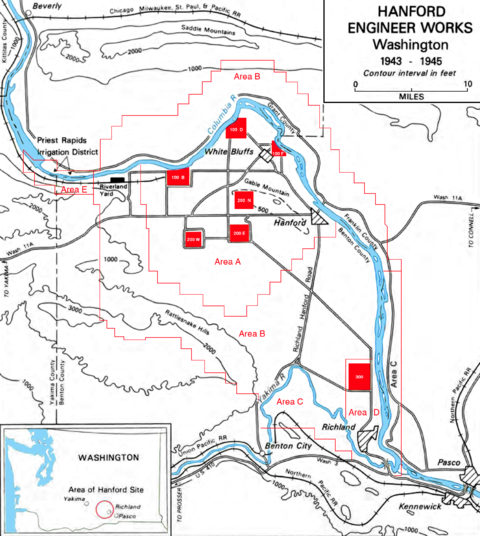 A contour map showing the fork of the Columbia and Yakima rivers and the boundary of the land, with seven small red squares marked on it