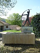 Bogenschützen-Brunnen, 1974, bei Schiessplatz in Riehen. Von Hans Schmid (1903–2002) Bildhauer, Maler.