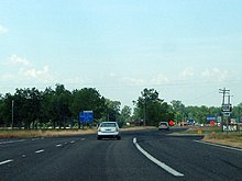 Highway 108 western terminus at US 59/US 71. This junction is entirely in Texas. Highway 108 western terminus at US 59 and US 71.jpg