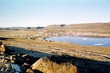 Looking at Ulukhaktok, Canada from the bluffs that give the community its name, 1980s Holman 1980s.jpg