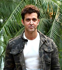 Hrithik Roshan is looking towards the camera.