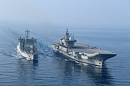 INS Deepak (at left) conducts a RAS with INS Vikrant. INS Vikrant (R11) getting refuelled by INS Deepak (A50) at sea.jpg