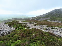 Inside the Celtic Iron Age hillfort of Tre'r Ceiri, Gwynedd Wales, with its 150 houses; finest in Europe 83.jpg