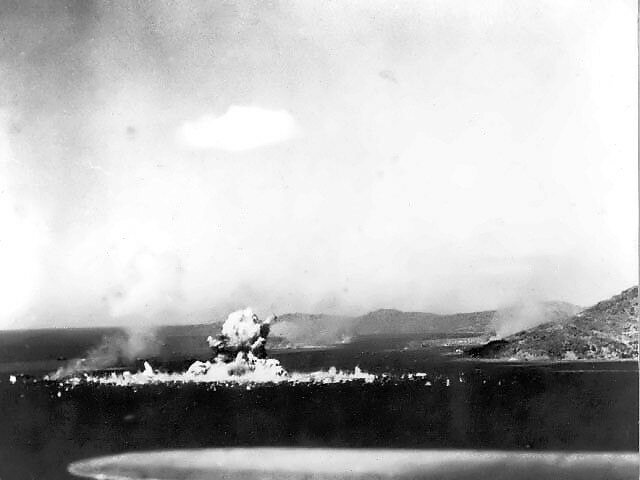 Japanese ammunition ship Aikoku Maru exploding after a torpedo hit, 17 February 1944.
