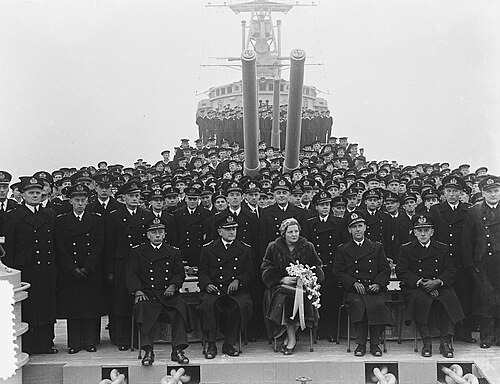Her Majesty Queen Juliana of the Netherlands and Captain W. J. Kruys with Officers and crew at the commissioning of HNLMS De Ruyter (1953)