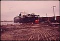 LUDINGTON FERRY TO WISCONSIN. LOADING RAILROAD CARS WITH TRACTORS AND FARM EQUIPMENT - NARA - 547056.jpg