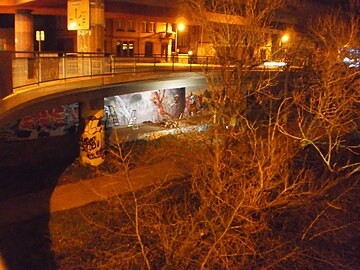 Artists working under the bridge (December 2016), at Night in Marburg,