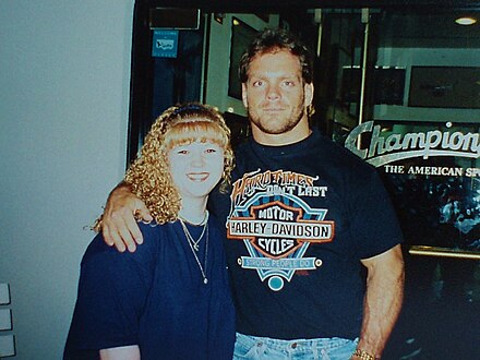 Benoit with a fan during his time in WCW