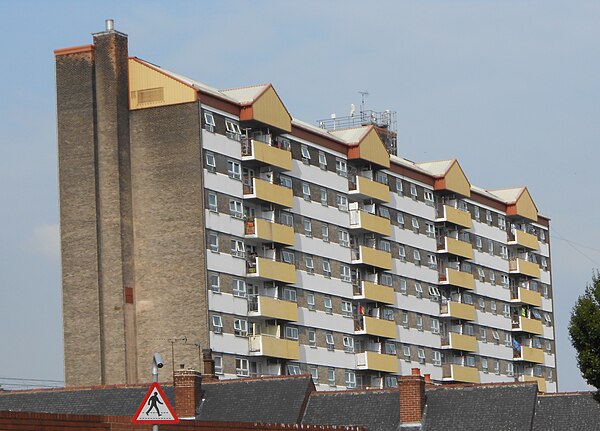 Luke Williams House is the centrepiece to the Horsefair flats in Pontefract, designed by Poulson. The pitched roof was added later