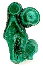 Malachite from Kolwezi in Shaba Province, the province was renamed by Mobutu in 1972 is rich in copper, cobalt and radium and uranium (Shinkolobwe). Malachite-261697.jpg