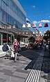 Image 871Man with grocery bags on the Smedsgränd street, Uppsala, Sweden